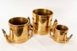 BRASS IMPERIAL 'COUNTY OF GLOUCESTER' STANDARD FLUID MEASURES, with turned wood handles,