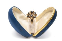 18K GOLD SAPPHIRE DRESS RING, tiered conical open loop design set with nine sapphires, stamped