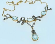 EDWARDIAN AQUAMARINE, DIAMOND CHIP & SAPPHIRE BOW PENDANT NECKLACE, on 14ct gold chain, 16.8gms