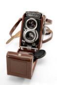 A BABY ROLLEIFLEX 3.5F TLR CAMERA - black, serial no. 2066799, with a Schneider-Kreuznach, Xenar f/