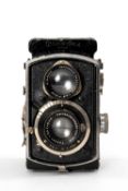 A BABY ROLLEIFLEX 3.5F TLR CAMERA - black, serial no. 133277, with a Carl Zeiss Jena Tessar f/3.5