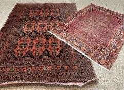 ORIENTAL RUG, probably Afghan, navy blue and burnt orange styled floral field, 196 x 135cms;