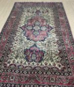 GOOD ANTIQUE PERSIAN 'TREE OF LIFE' RUG, probably Isfahan, four-pointed star on shaped medallion, on