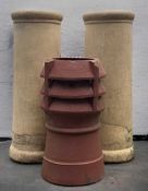 THREE TERRACOTTA CHIMNEY POTS, two measuring 76cms tall, the other 55cms (3)