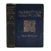 WELLS (H.G.) The First Men in the Moon. FIRST EDITION, with black coated endpapers, frontispiece and