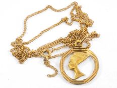 18CT GOLD NEFERTITI PENDANT, on 9ct gold fine chain, 4.4gms gross (2) Provenance: deceased estate