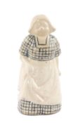 ROYAL DOULTON STONEWARE FIGURE, of a Dutch woman model H9, designed by Leslie Harradine c. 1912,