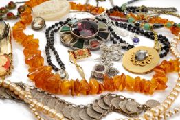 ASSORTED COSTUME & DRESS JEWELLERY comprising various necklaces, brooches, amber beads, cameo