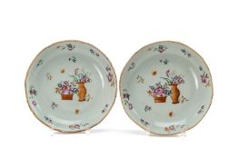 PAIR CHINESE FAMILLE ROSE SAUCER DISHES, Qianlong, of lobed form, centre painted with basket and