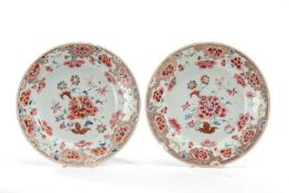 PAIR CHINESE FAMILLE ROSE PLATES, Qianlong, painted with peony and other flowers within scrolling