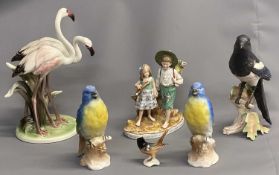 GOEBEL MAGPIE PERCHED ON A BRANCH, 26cms H, pair of German exotic bird ornaments, continental vase