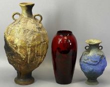 ROYAL DOULTON FLAMBE VASE of baluster form, decorated with cottage and landscape design, black