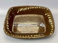 SLIPWARE RECTANGULAR DISH, PROBABLY BUCKLEY, 19th Century, brown glazed earthenware with trailed
