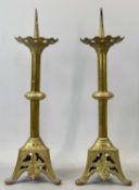 VINTAGE FRENCH BRASS PRICKET CANDLESTICKS, A PAIR, pierced triangular bases, 56cms H
