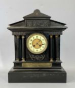 VICTORIAN BLACK SLATE MANTEL CLOCK, of architectural design, the pediment having frieze with