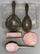 HALLMARKED SILVER DRESSING TABLE ITEMS ON A RECTANGULAR CUT GLASS TRAY, to include a circular hand