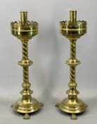A PAIR OF VICTORIAN GOTHIC REVIVAL BRASS ALTAR CANDLESTICKS substantial & highly decorative with