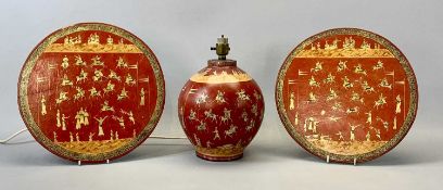 NORTH INDIAN / KASHMIR PAPIER MACHE CIRCULAR PLAQUES, A PAIR, decorated with polo players on red