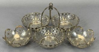 PIERCED SILVER SWEET MEAT DISHES WITH BIRMINGHAM HALLMARKS, including a triple bowl example, date