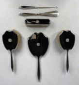 SIX-PIECE ART DECO SILVER & BLACK ENAMEL DRESSING TABLE MIRROR AND BRUSH SET ETC, Birmingham 1934/