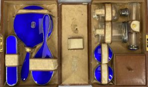 TRAVELLING VANITY CASE WITH SILVER & COBALT BLUE GUILLOCHE ENAMEL CONTENTS, BIRMINGHAM 1928, to