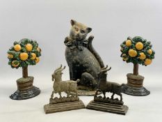 CAST IRON DOORSTOP, late 19th Century, modelled as a seated cat wearing a bow tie, 37.5cms H, cast