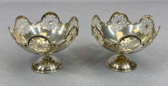 PIERCED SILVER SWEET MEAT DISHES, A PAIR, Sheffield 1936, Walker & Hall, having lobed upper rims