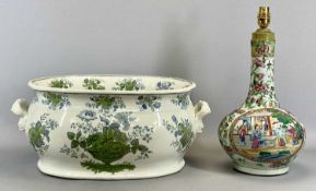 POTTERY TWO HANDLED FOOTBATH, late 19th Century, decorated in blues and greens with floral baskets