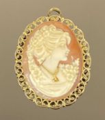 18CT GOLD SHELL CARVED CAMEO BROOCH WITH HANGING LOOP, the carving depicting head and shoulders of a
