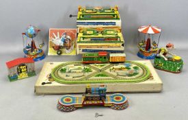 BOXED RUSSIAN TINPLATE CLOCKWORK TRAIN SET, the base 47 x 22cms, 3 x other boxed Russian tinplate