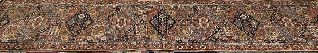 EASTERN STYLE WOOLLEN CARPET RUNNER, multicoloured repeating pattern central block, with block