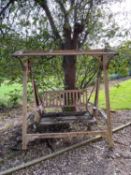 HARDWOOD GARDEN SWING BENCH, 190cms H, 180cms W, 110cms D Provenance: deceased estate Denbighshire