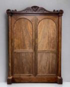 WILLIAM IV MAHOGANY LINEN PRESS, acanthus scroll pediment, reel moulding above columns, full