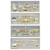 COLLECTION OF THIRTY COALPORT PASTILLE BURNERS, in the form of cottages, lighthouses, halls and
