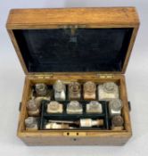 LATE 19TH CENTURY OAK APOTHECARY CHEST / BOX, with gilded brass escutcheon, a hinged lift up lid