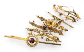 SEVEN 9CT GOLD BAR BROOCHES, of various design including flowerheads and foliage, halo, set with