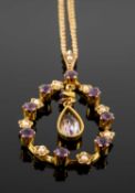 15CT GOLD AMETHYST & SEED PEARL PENDANT, with central drop pear shaped amethyst, on yellow metal