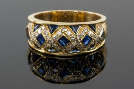 18CT GOLD SAPPHIRE & DIAMOND CHIP RING, of geometric design, ring size Q 1/2, 8.5gms Provenance:
