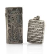 TWO 19TH C. SILVER VESTA CASES, one by Isaac Summers, Birmingham 1897, foliate banded and feather