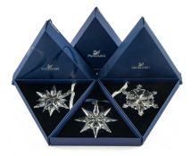 THREE SWAROVSKI CHRISTMAS ORNAMENTS, boxed, 2009, 2011, 2012 (3) Provenance: private collection
