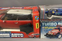 REMOTE CONTROL VEHICLES (3) LARGE SCALE 27 MHZ REMOTE CONTROL MINI AUTO, BOXED, and 2 x other