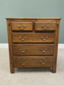 REPRODUCTION OAK CHEST OF TWO SHORT OVER THREE LONG DRAWERS with circular brass pommels and swan