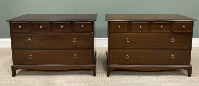 TWO STAG MINSTREL CHESTS OF FOUR SMALL OVER TWO LONG DRAWERS, having turned brass knobs and ring