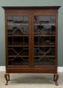 GOOD MAHOGANY TWO-DOOR GLAZED BOOKCASE circa 1900, having block detail to the inverted cornice