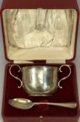GEORGE V SILVER PORRINGER of plain circular form, with scrolled side handles, inscribed to '