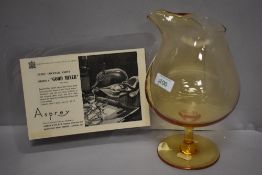 A mid century Whitefriars Asprey and co, Amber glass cocktail mixer with advert