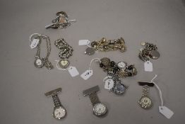 10 wrist watches all in silver tones.