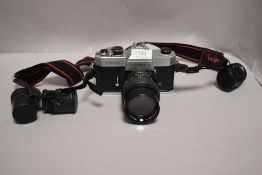 A Yashica TL-Electro camera No 50701849 with Helios 1:2,8 f=135mm lens No 822733-3