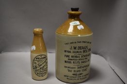 A earthenware flagon, of J.W Deakin Bolton interest, and a similar bottle for Wm Glasgow, Kendal.