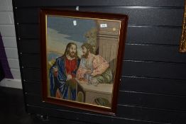 An early 20th century needle work, framed and glazed.
